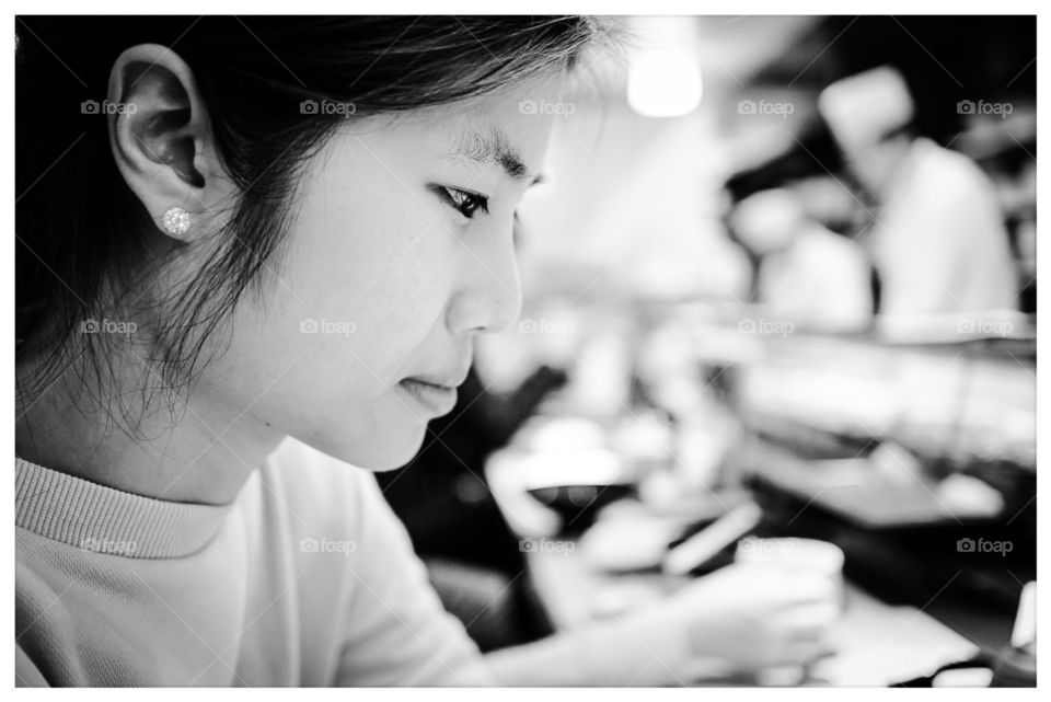 Japanese girl in sushi bar