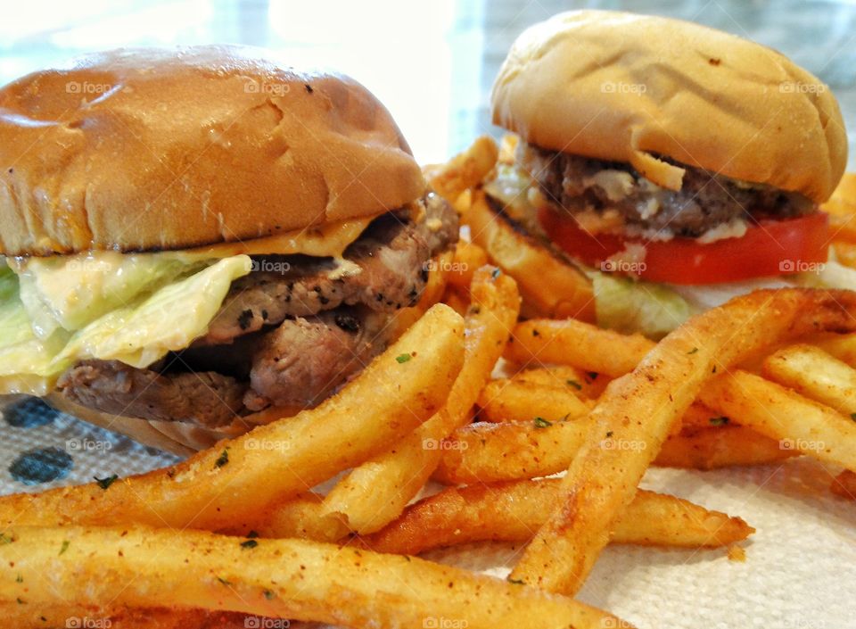 Burgers And Fries. American Hamburgers And Fries
