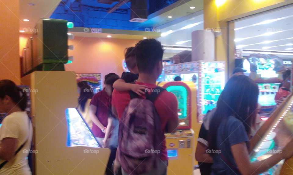 father and son watching games