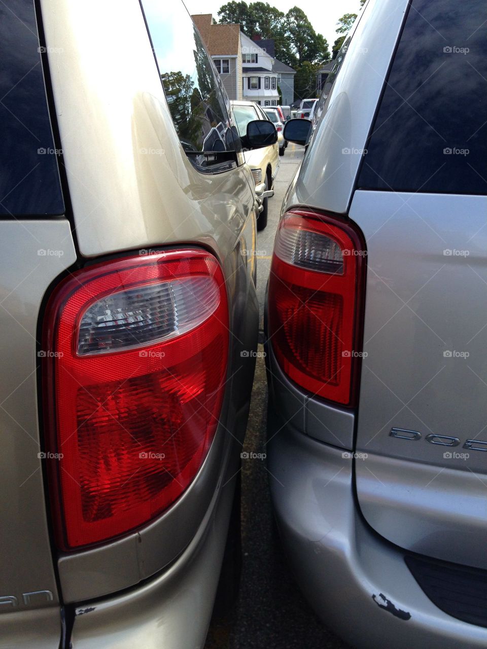 Bad Parking in parking lot. Scraped up & dented cars. Accident.