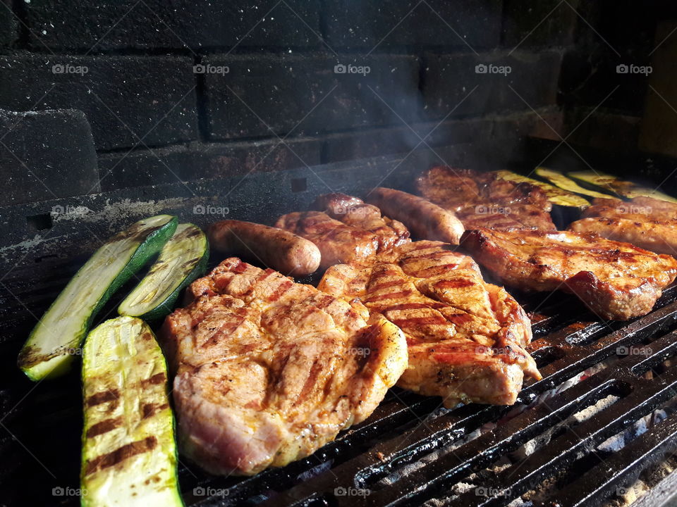 meat with vegetables on barbecue