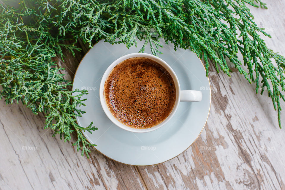 Coffee espresso on the wooden background 