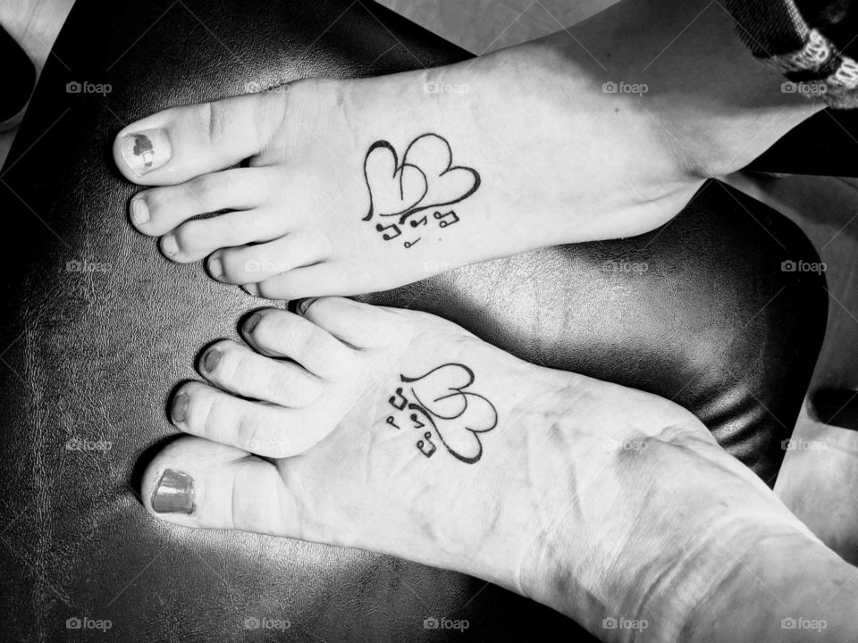 Love with a Mother and daughter tattoo.