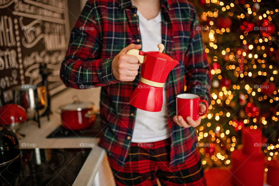 cup of coffee in a cozy festive Christmas atmosphere