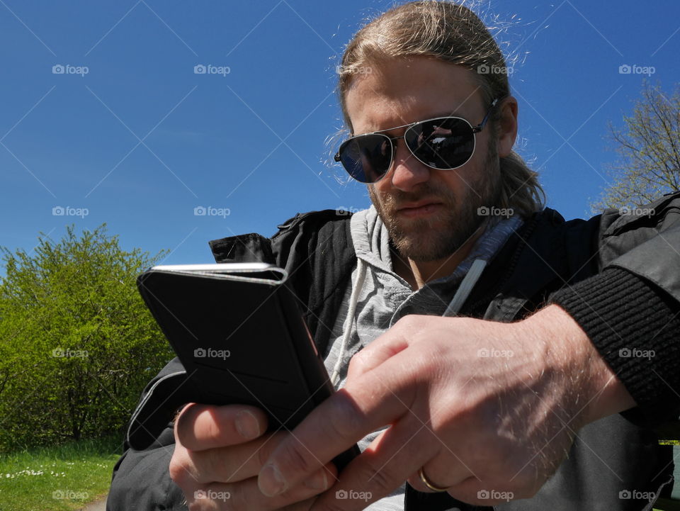 Man using smartphone