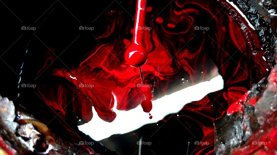 Abstrata imagem bonita de tinta velha, vermelha com mesclado negro.