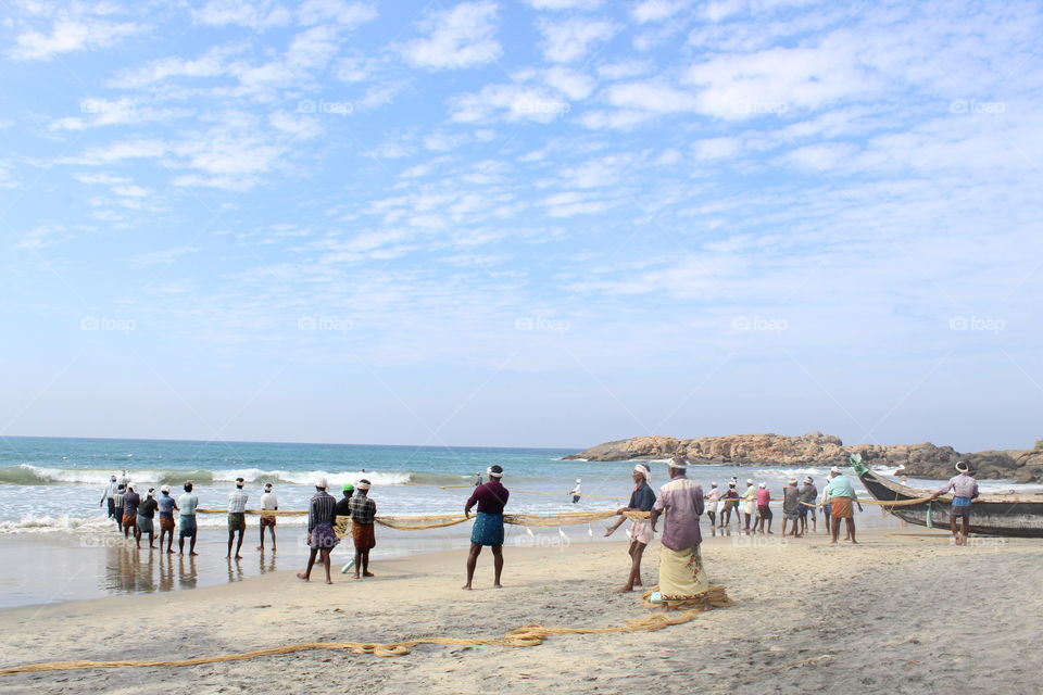 Catching Fish at Covlam Beach