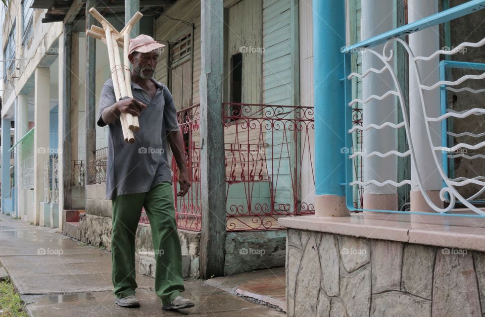 Mops Street Vendor. Street vendor selling mops