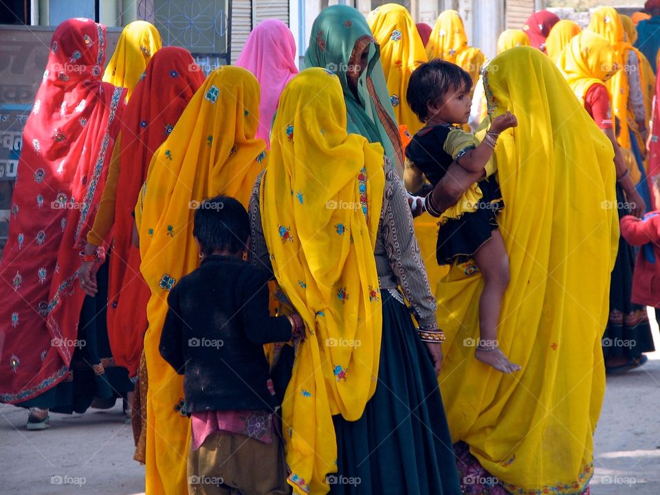 Women in saris, India. A group of women wearing saris in India