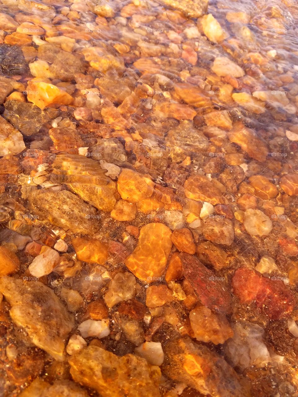 pebbles clear water