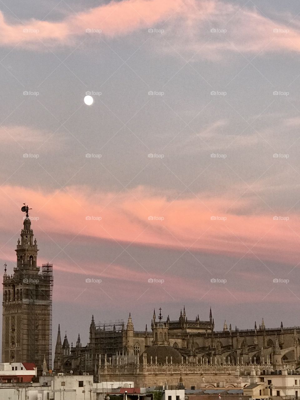 Sevilla’s Cathedral at sunset, under the full moon 