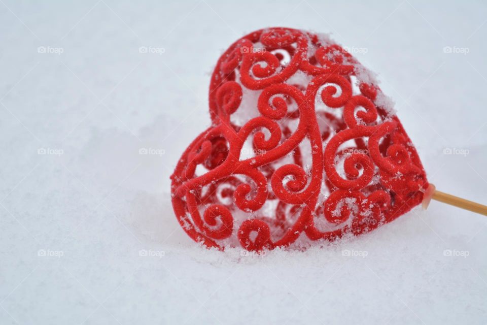 red heart in the snow