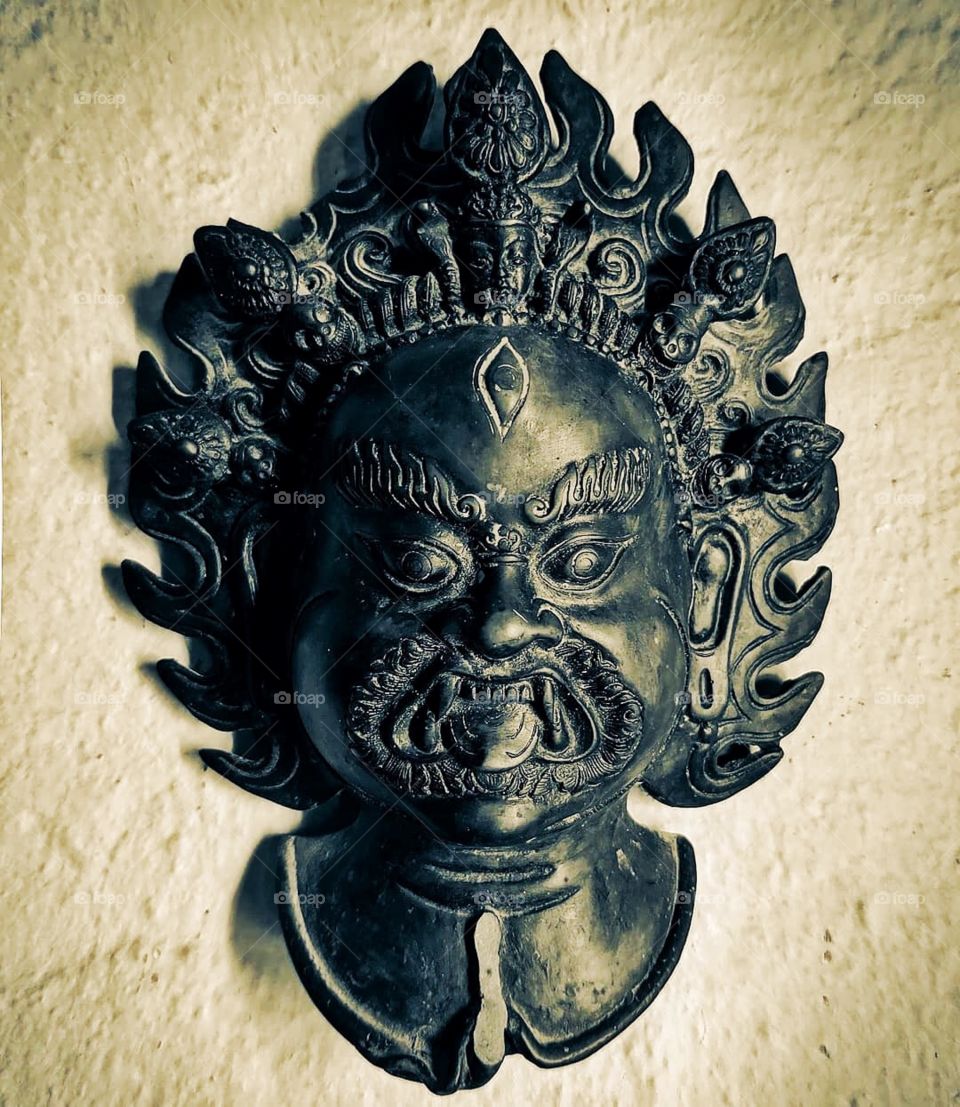 A tradition hand-crafted mask, a display of incomparable indigenous craftsmanship.