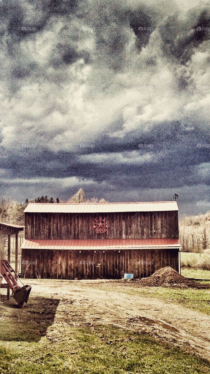 Barn. Barn with stormy background 