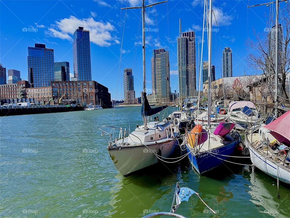 This is “Newtown Creek” by the “Pulaski Bridge” in LIC, Queens seen from aboard one of the boats moored here called “Salvation”, the “28 ft 1969 Luhrs” cabin cruiser that I and my partner “Timothy Trespas” call home. 2024. Hypnotic Productions