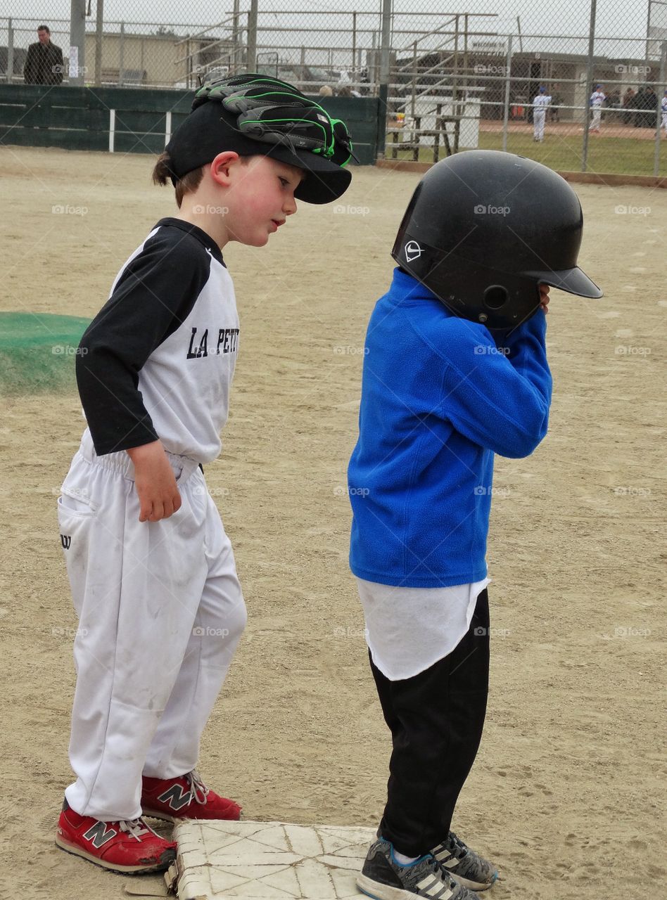 Consoling A Friend. Young Boy Consoling A Crying Girl
