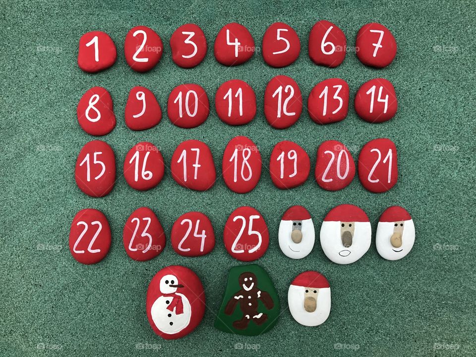 Christmas countdown calendar on stones 