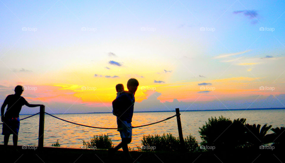 Daddy and I . Father and son enjoying the golden hour