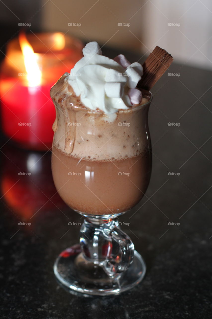 Festive Hot Chocolate. A hot chocolate drink with whipped cream and a flake on a festive Christmas Day.