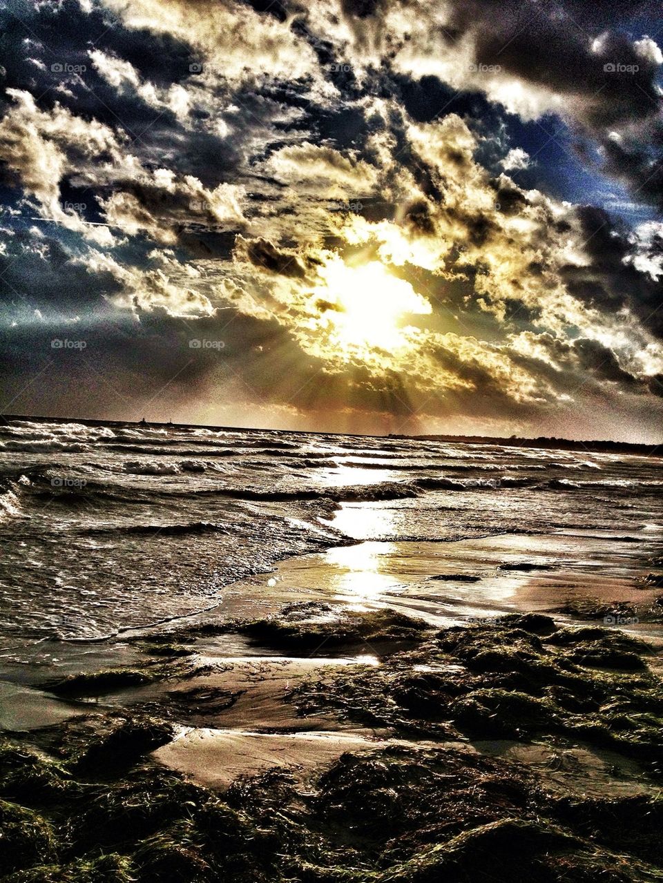 Sun rays through clouds