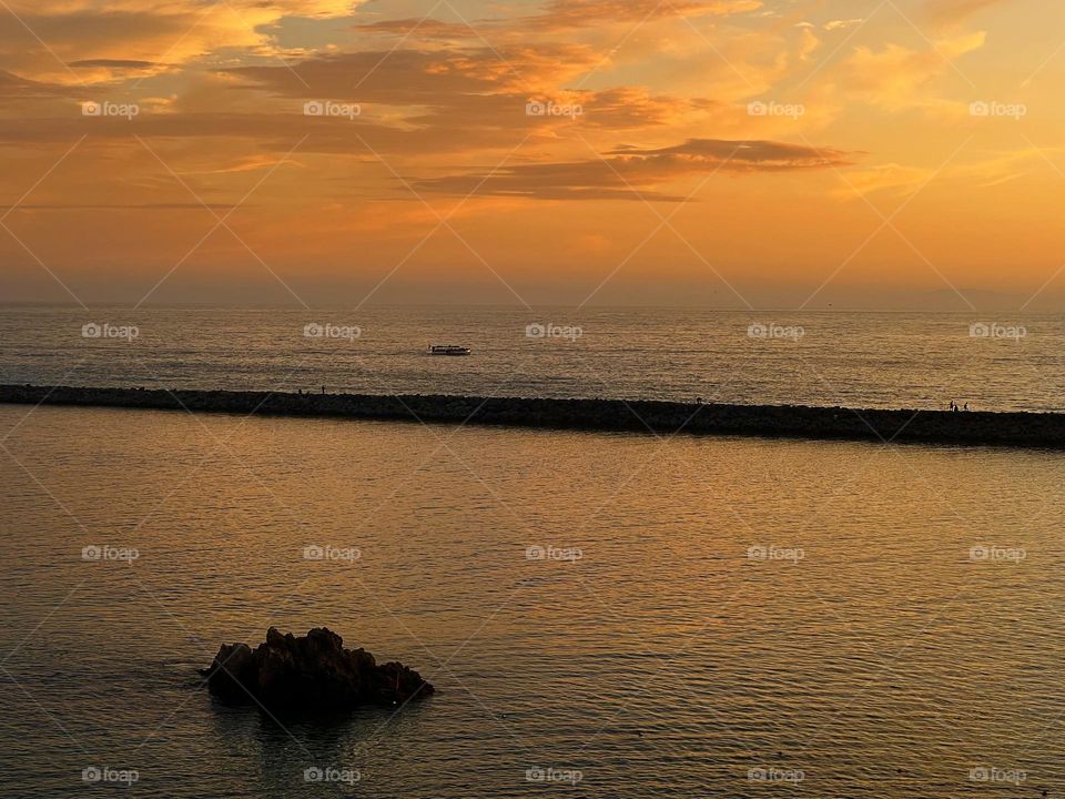 Beautiful sunset over the Pacific Ocean from the Lookout Point in Corona del Mar 