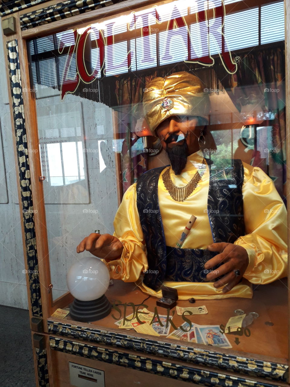 old zoltar fortune teller machine. look into the crystal ball
