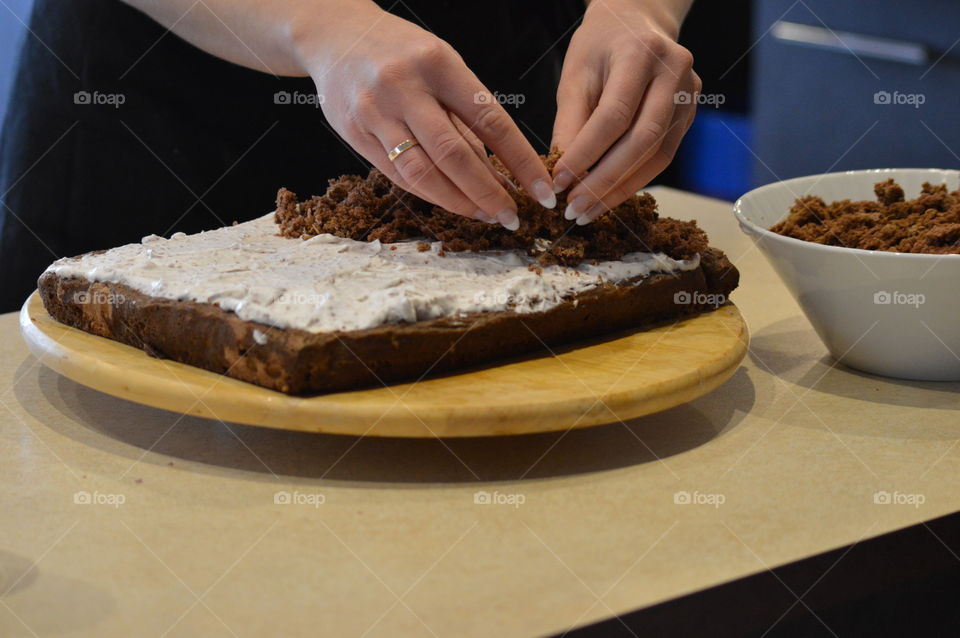 Person preparing sweet food