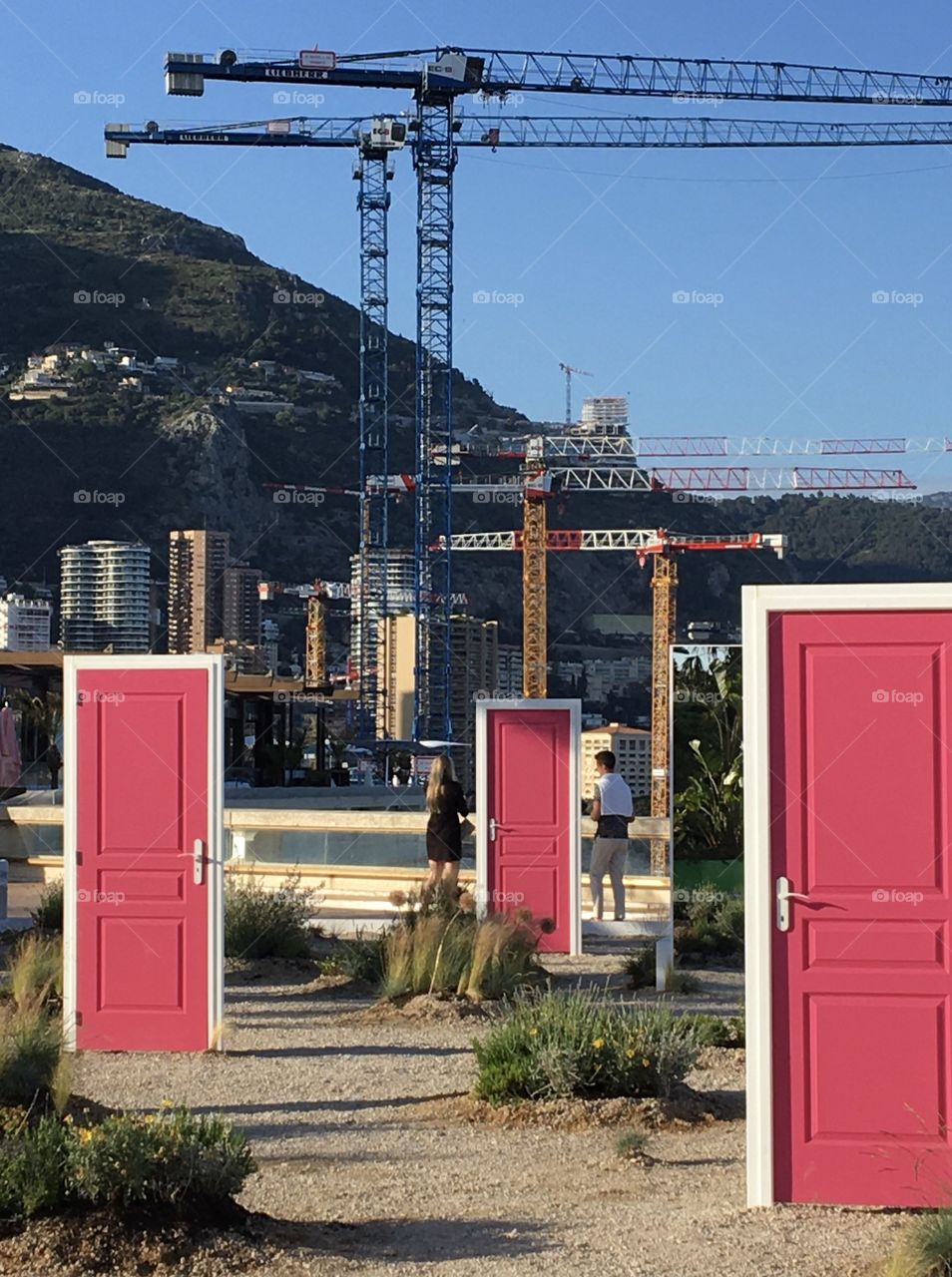 Art in city with cranes 