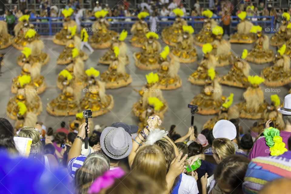 Crowd cheering up at the Carnival in Rio de Janeiro, Brazil