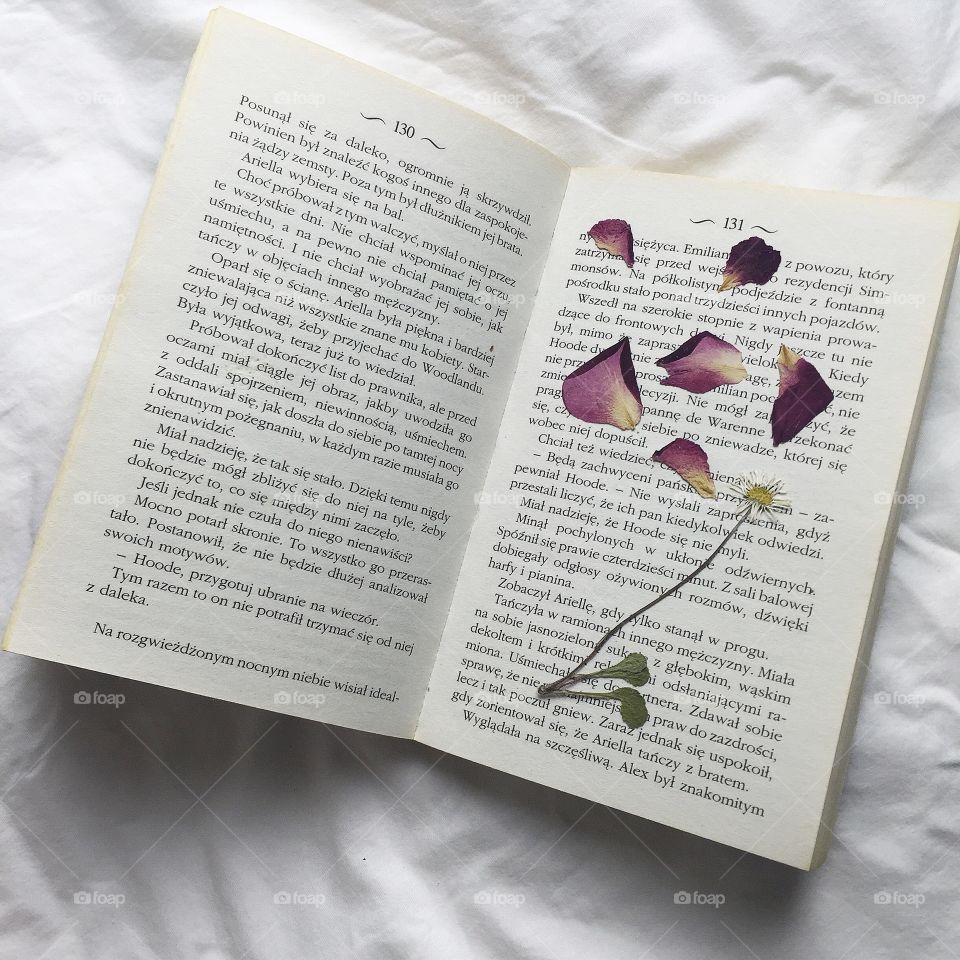 Flowery book.. Reading a book it can be so relaxing, more if you drink a cup of tee to it.