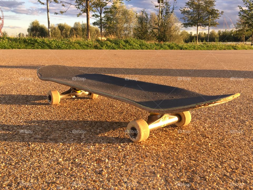 Skateboard at sunset.