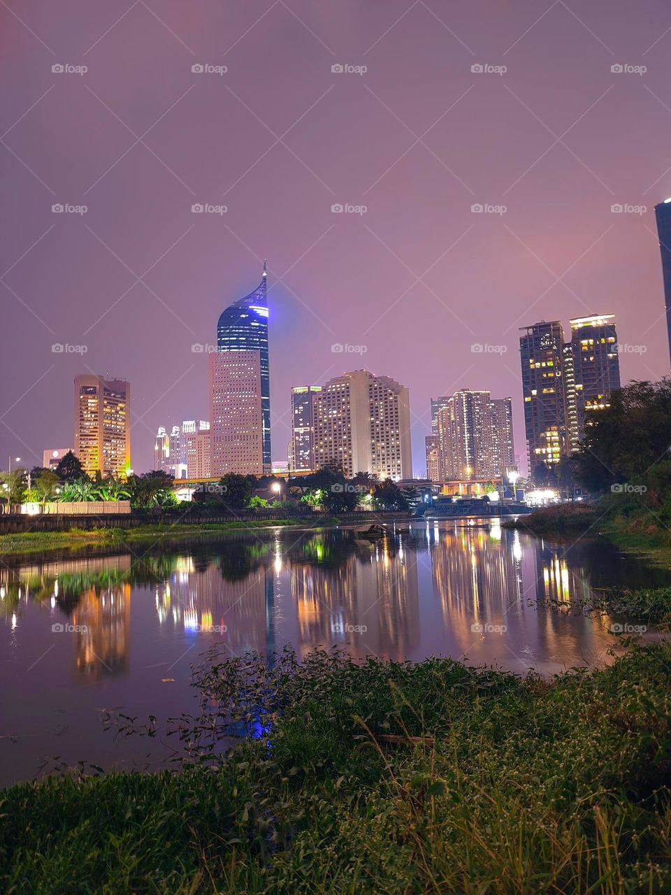 Jakarta at night from the Kebun Melati River, Thursday 25 May 2023