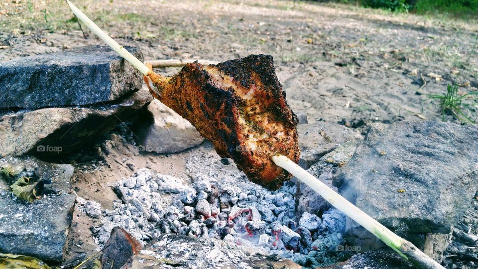 grilled sea bass on charcoal