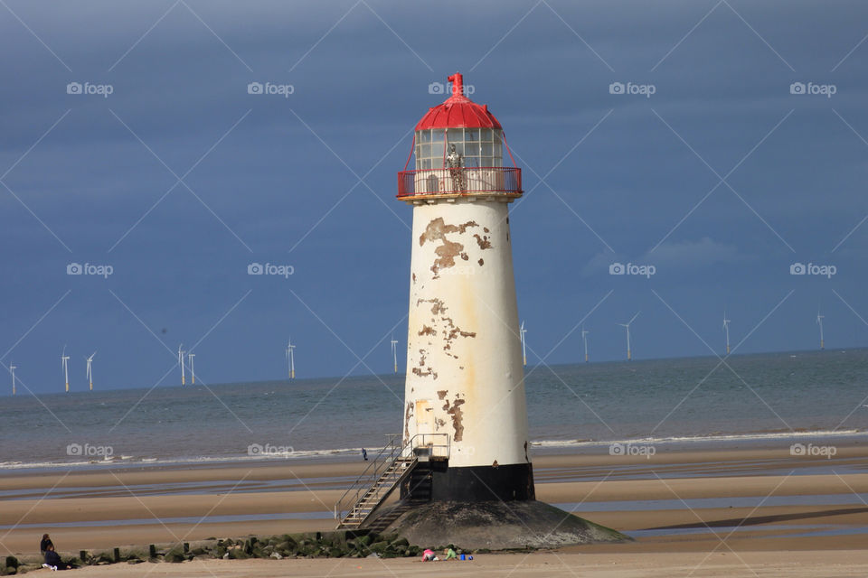beach sea lighthouse wales by sicksaint77