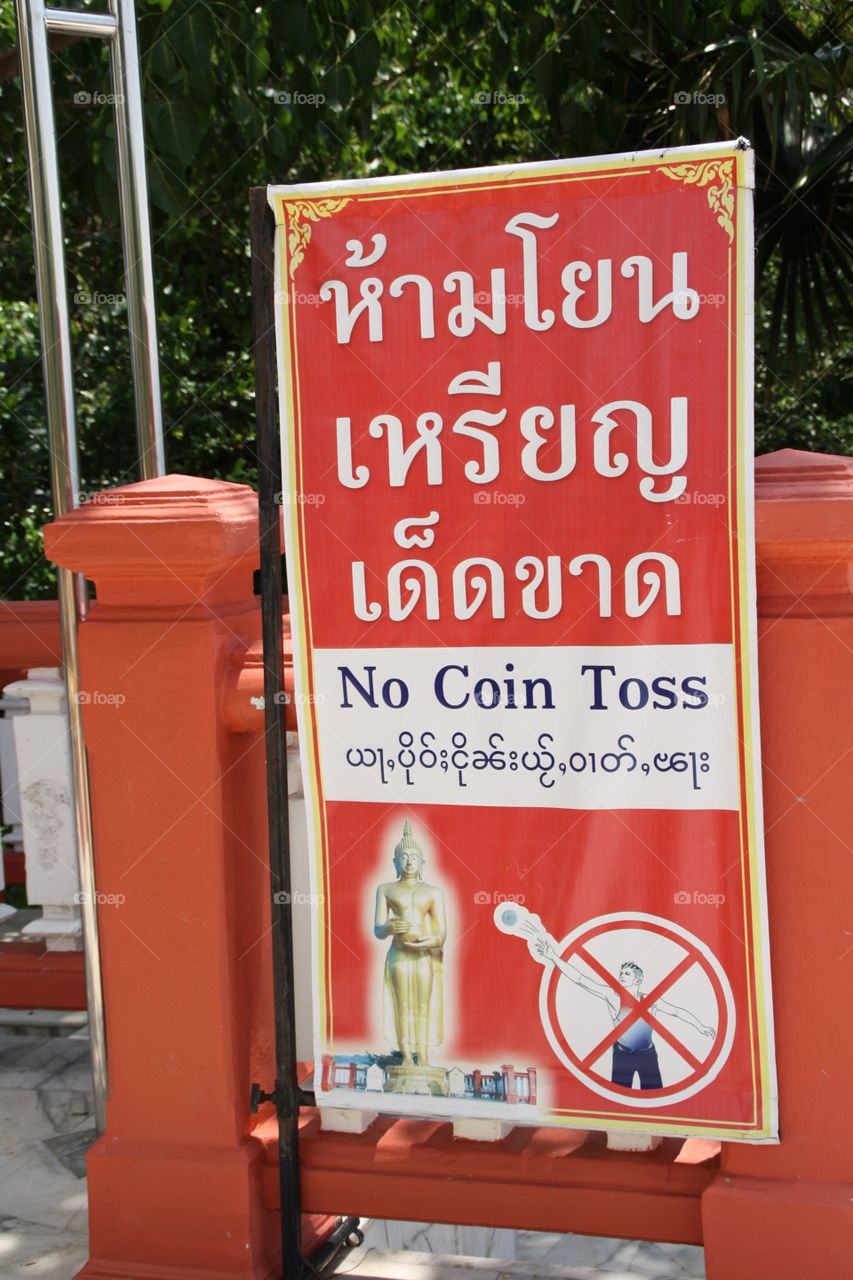 Buddhist humor . I saw this sign near a giant Buddha statute