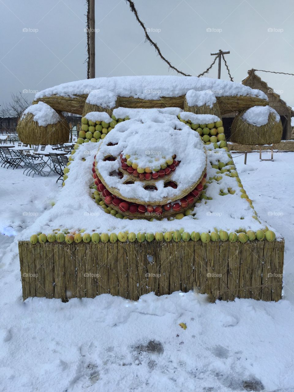 In case you have lost your mobile phone - don't worry, there is a substitute π Huge telephone made of straw, Apples and snow - seen on our winter walk in Rapperswil, Switzerland.
