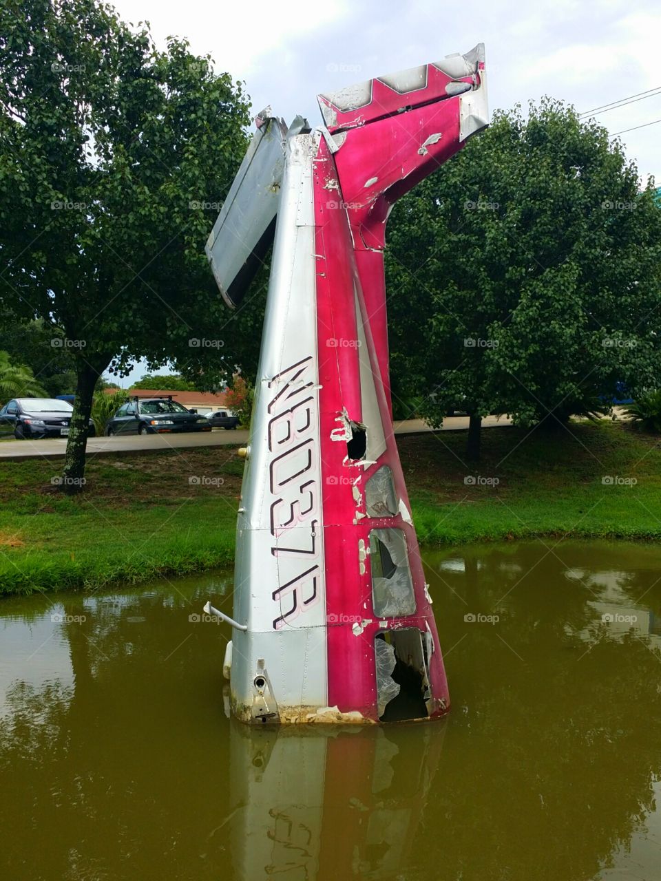 Just a Wrecked Plane. Small plane used as an attention-getter in front of a business.