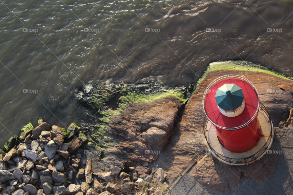 water rocks lighthouse rock by ipixxiqi