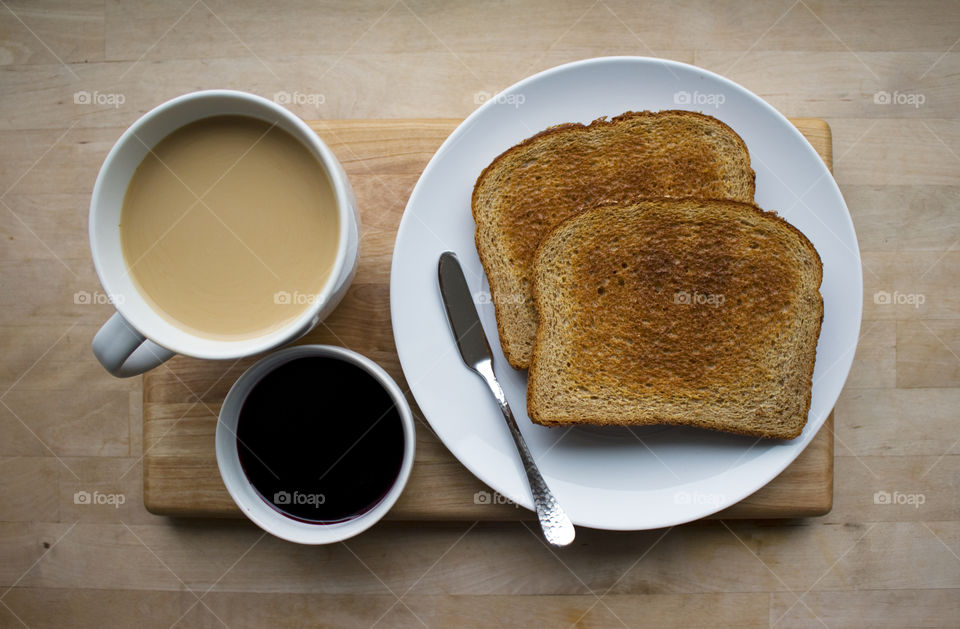 Coffee cup and toasted bread