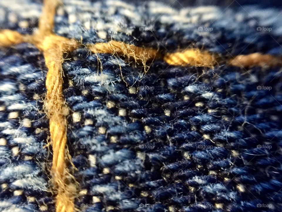 Close up of denim stitching 
