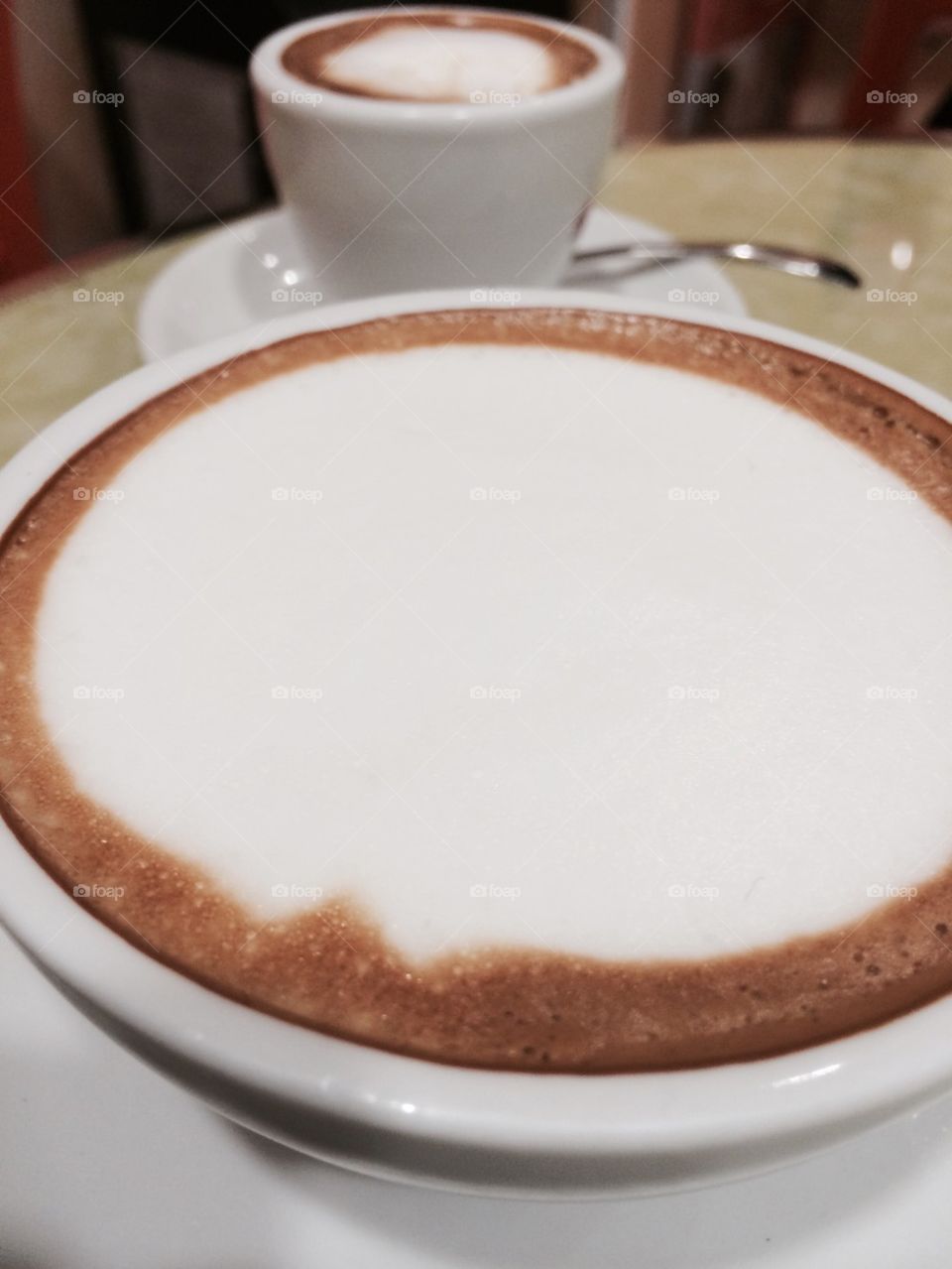 Close-up of coffee with cappuccino