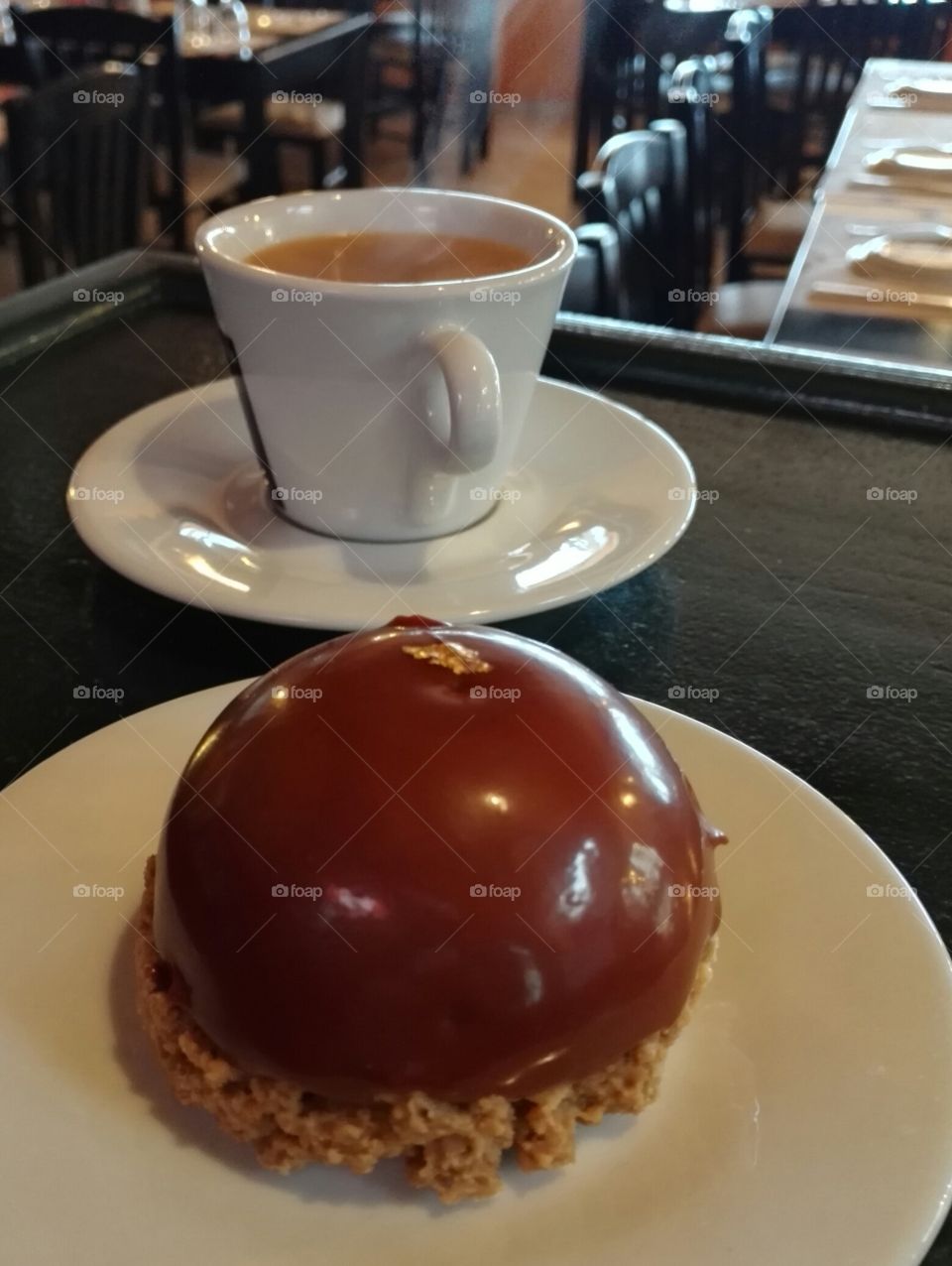 hot coffee cup and sweet on a bar