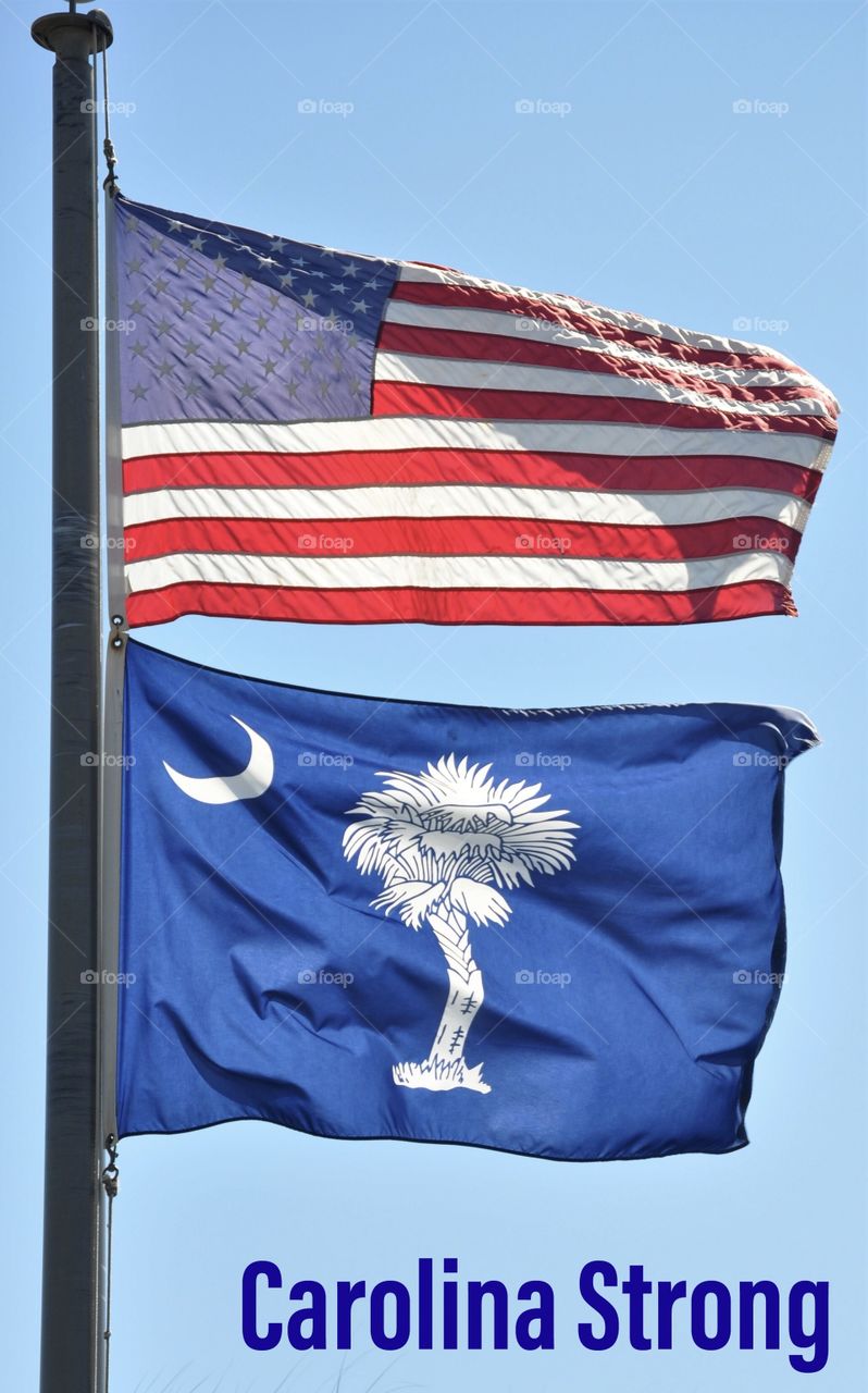 American Flag and South Carolina Flag with the phrase Carolina Strong.