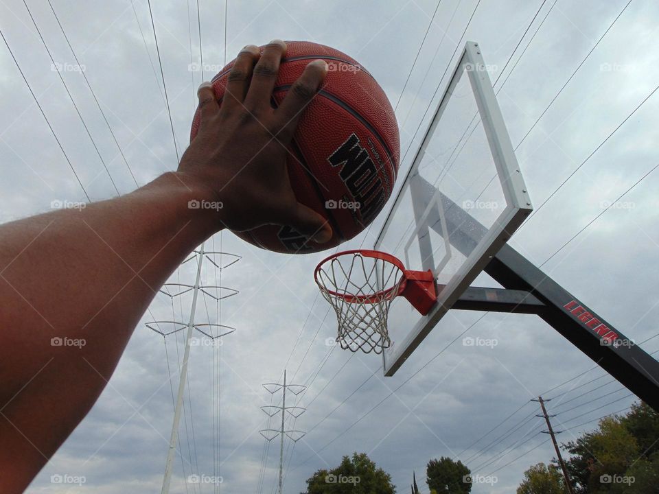 playground basketball time on a cloudy day