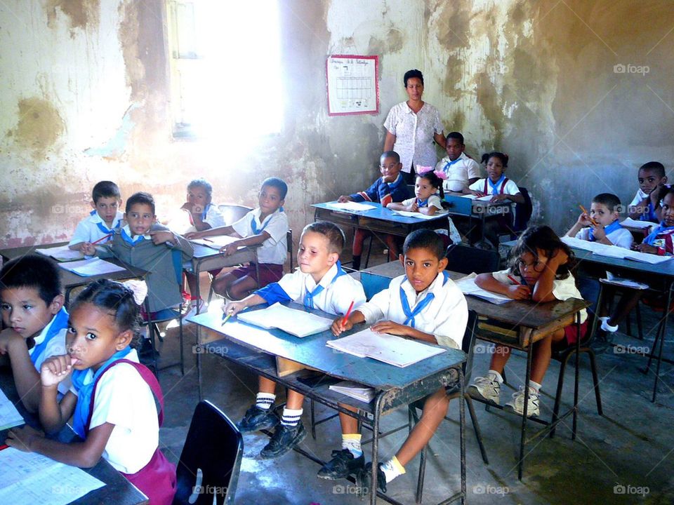 A day a Cuban classroom . Students at work