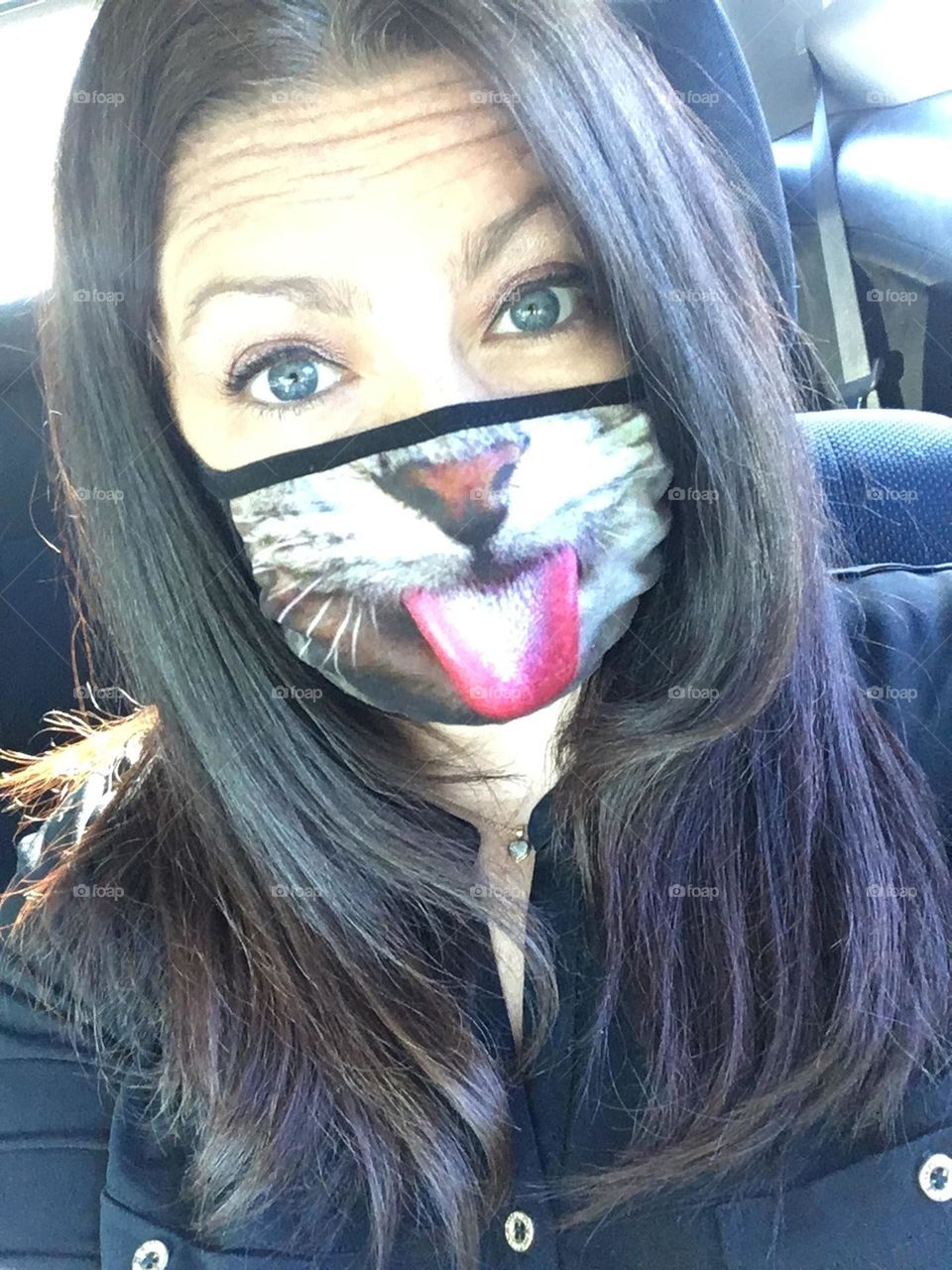Long dark hair with a kitty mask selfie