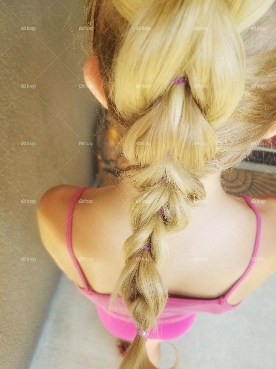 a little girl with the bold dragon braid