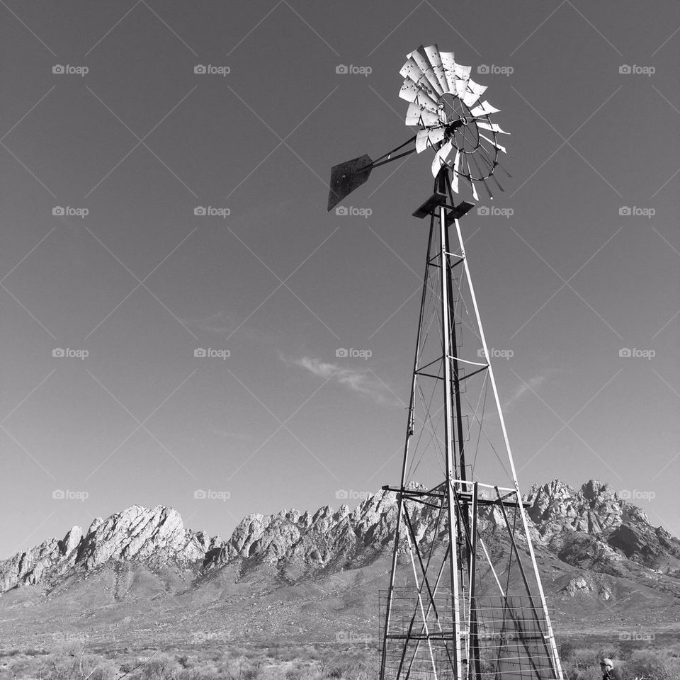 windmill in front of the Organ Mountains