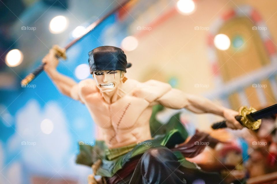 Bangkok, Thailand - February 24, 2018 : a photo of One Piece character pirate Zoro, the samurai swordman. One piece is a very famous and successful Japanese animation and manga. Editorial use only.