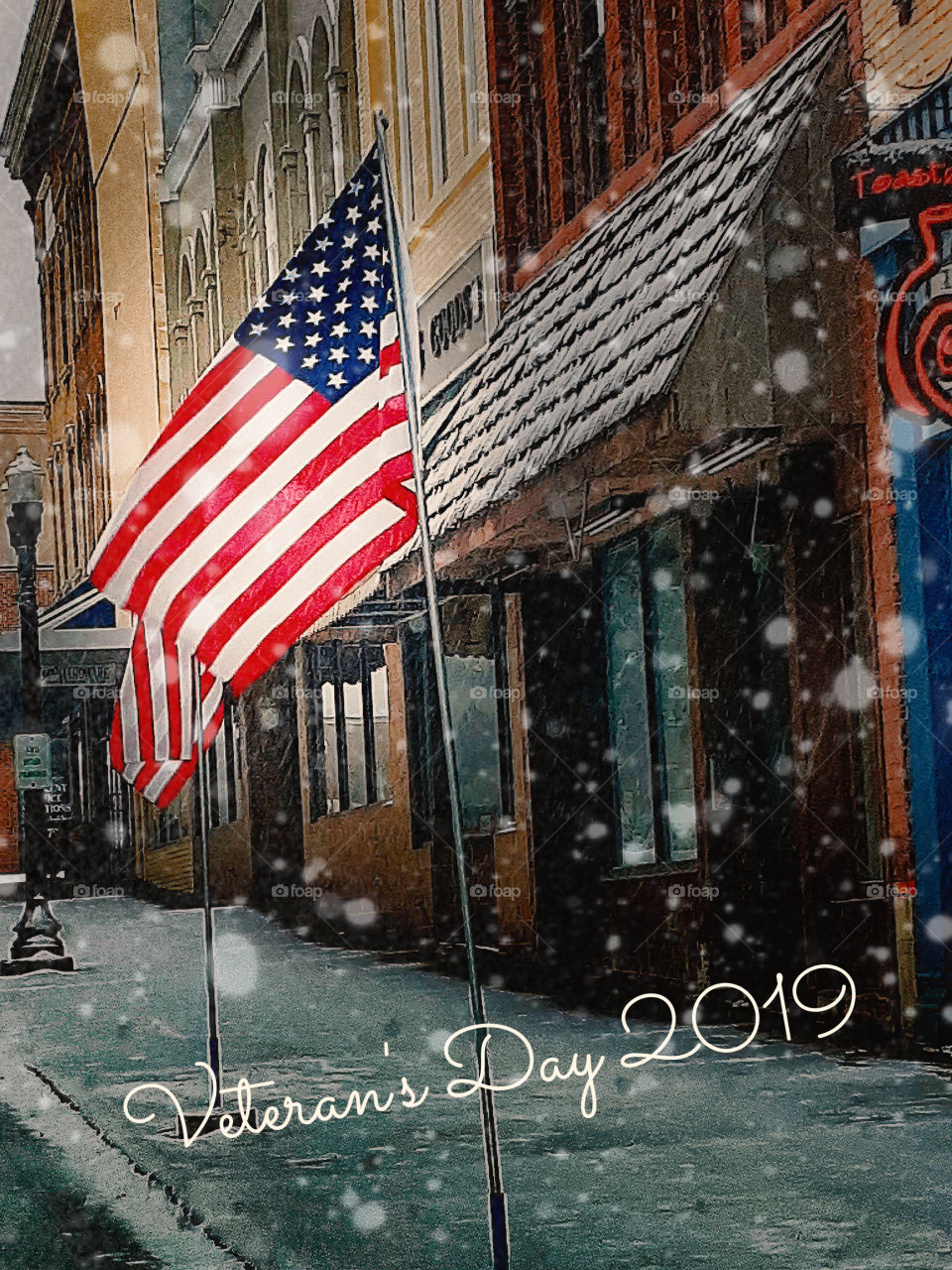 Veterans day flag and snow downtown